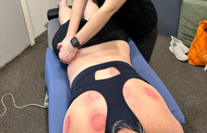 Chloe performing chiropractic care